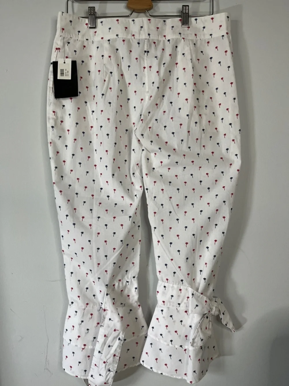 White Cropped Pants with Red & Navy Palm Print w/Ruffled Ties on each leg.  Sz L